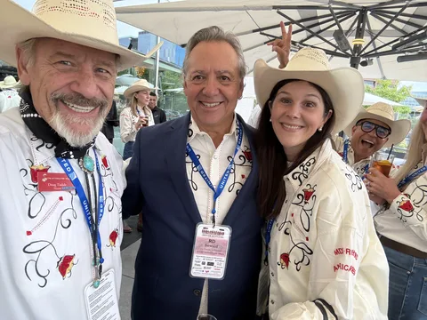 Doug Tisdale with community supporters at an outdoor event